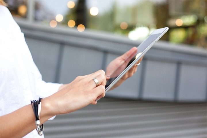 Ecommerce woman holding tablet image